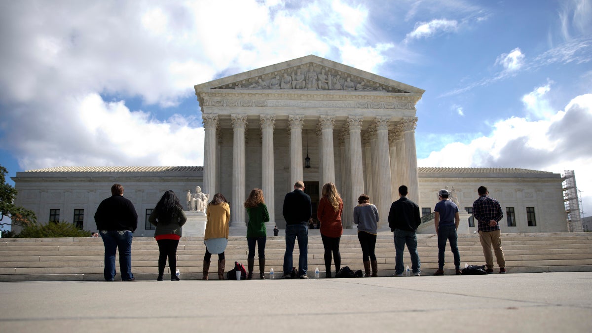  Protesters gather in front of the Supreme Court in Washington, D.C. (AP Photo/Carolyn Kaster) 