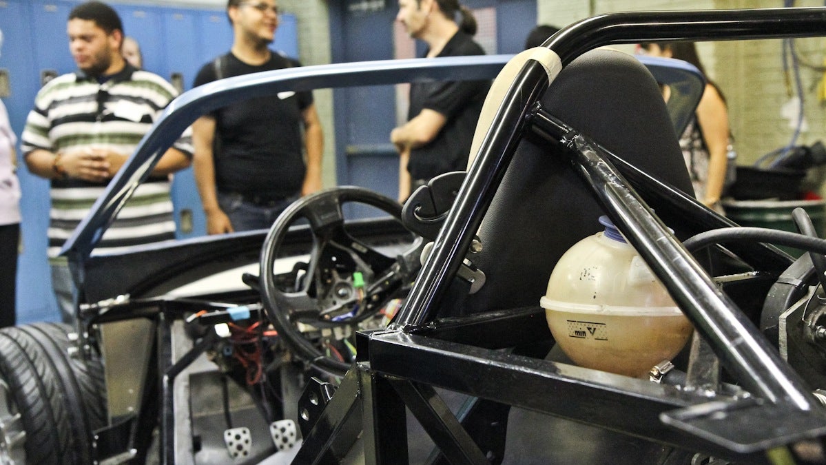  Students at the Workshop School learn real world skills by designing and then executing their own projects. They also learn how to build bio-deisel cars. (Kimberly Paynter/WHYY) 