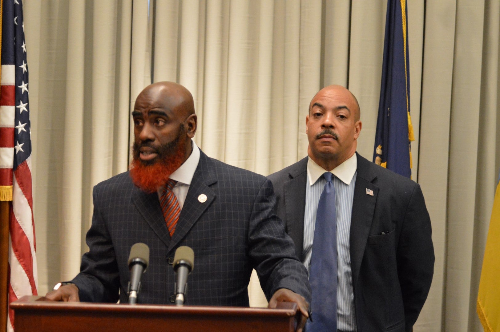 Philadelphia Deputy District Attorney Tariq El Shabazz and District Attorney Seth Williams discuss the shooting incident involving Officer Dorion Young. (Tom MacDonald/WHYY)