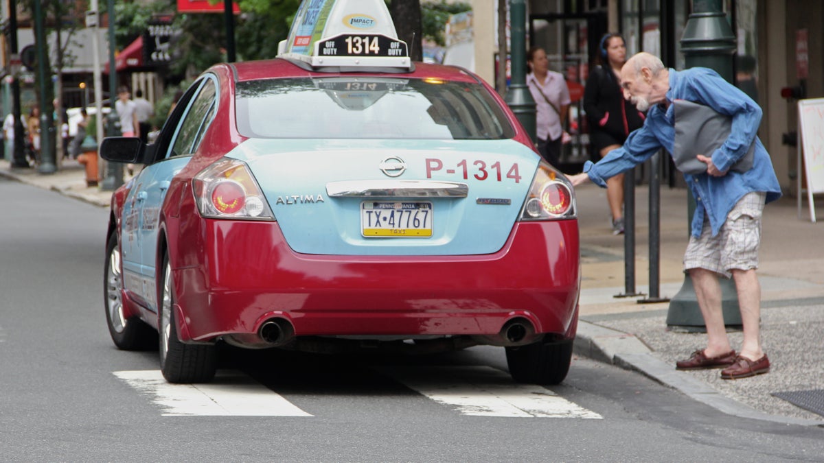  Philadelphia taxi companies are updating their technology to compete with ride-sharing services like Uber. (Emma Lee/WHYY) 
