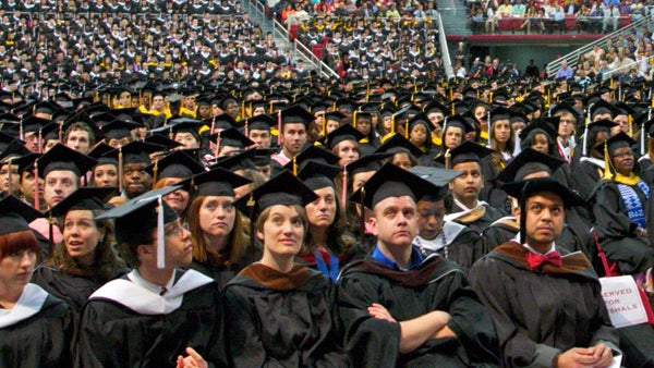  Members of Temple University's 2012 graduating class attend their commencement ceremony in Philadelphia. (Nathaniel Hamilton/for NewsWorks, file) 