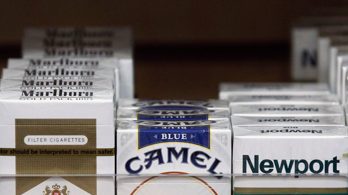  Packs of cigarettes are seen on display at a news stand in this file photo. Rep. John Lawrence of Chester County  has proposed a state-wide  80-cents-a-pack tax to help with higher school property taxes. (AP Photo/Charles Rex Arbogast, File) 