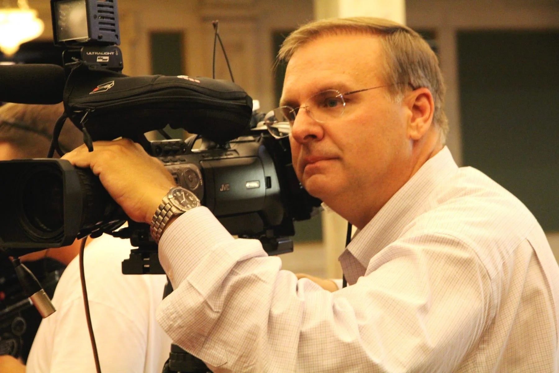 Tom MacDonald operates a camera