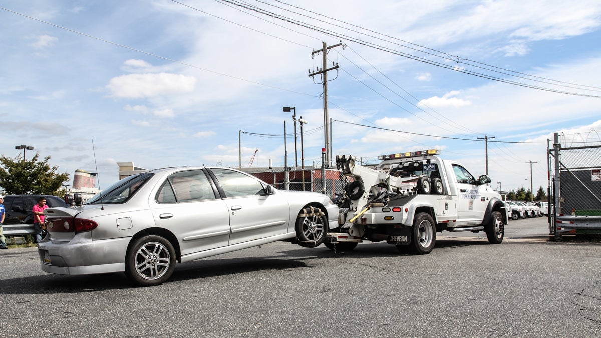  The Philadelphia Parking Authority will haul vehicles parked in restricted areas to one of its impound lots. (Kimberly Paynter/WHYY) 