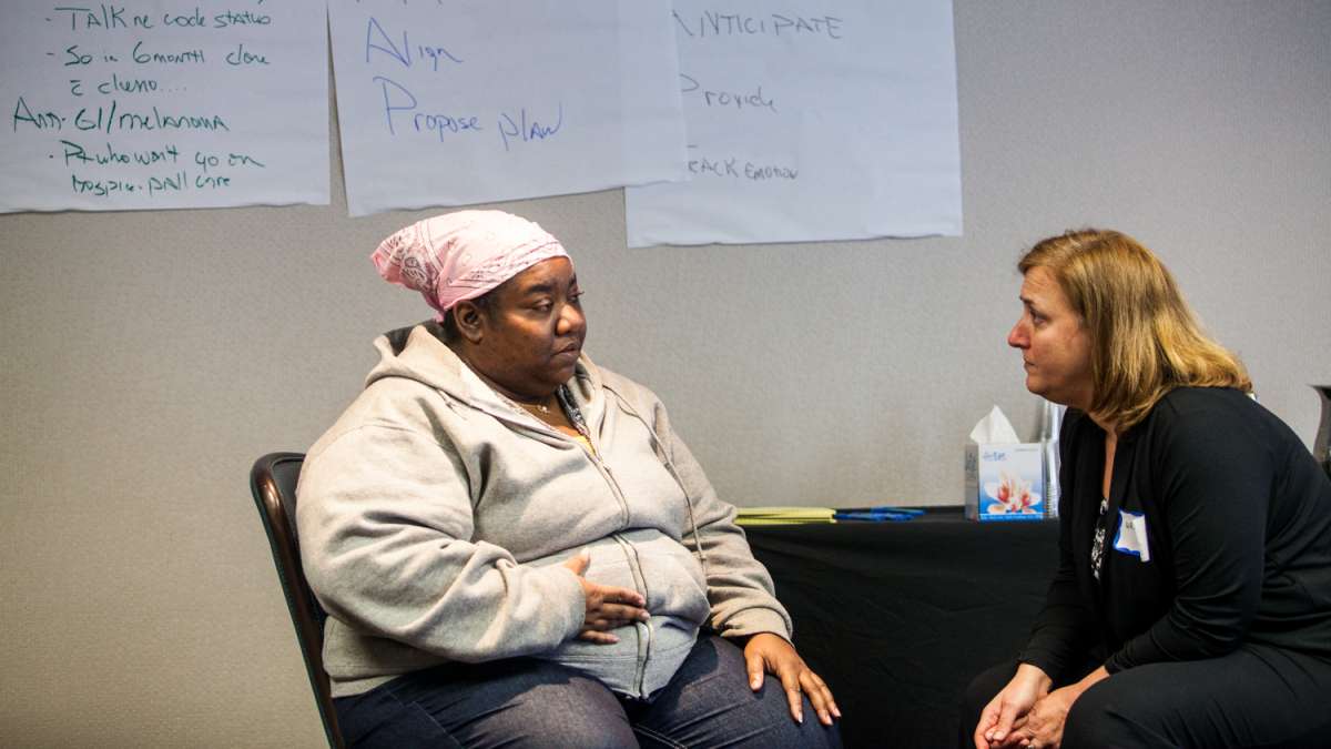 Actress Felicia Myers (left) portrayed a terminal cancer patient during the workshop. (Brad Larrison/for NewsWorks)