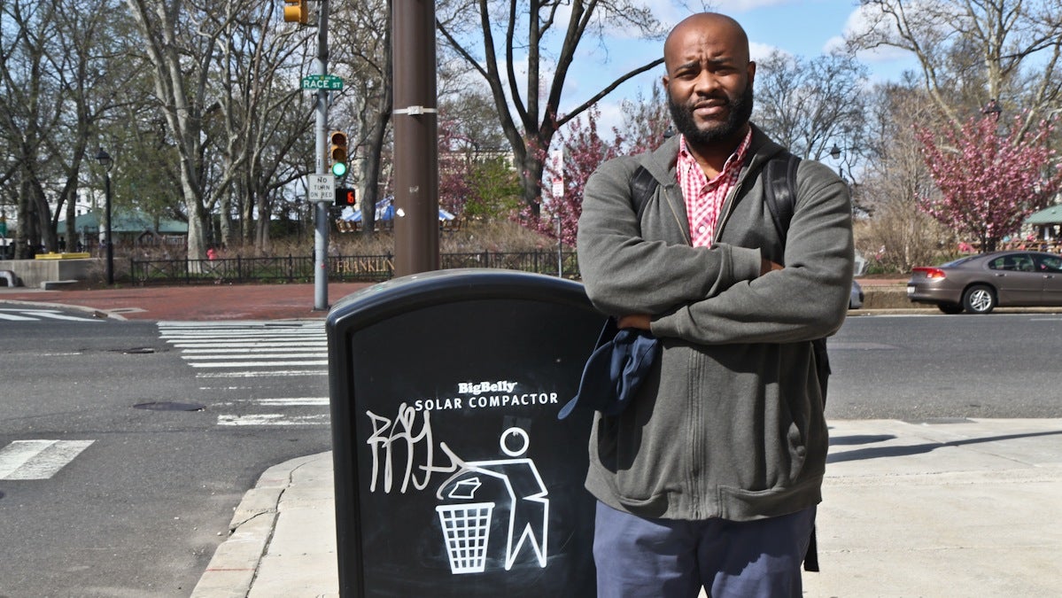  Kensington resident Dayo Adeyemi says he despises the solar compacting trash cans on the streets in Philadelphia. (Kimberly Paynter/WHYY) 