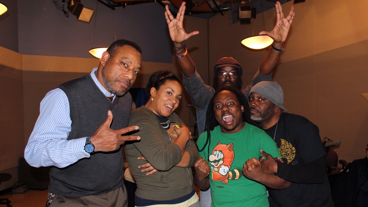  Dr. Derrick Pitts, left, henceforth known to Tribble Nation as UniversalTribble, stands with Storm Tribble (Kennedy Allen), Super Tribble (Randy Green), Spider-Tribble (Jason Richardson), and BatTribble (Len Webb) in WHYY's Studio 2. (Jeanette Woods/WHYY) 