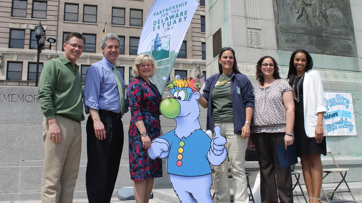  Delaware officials and activists stand next to Tropo, a new mascot for earth-friendly actions. (Matt Grady/NewsWorks) 