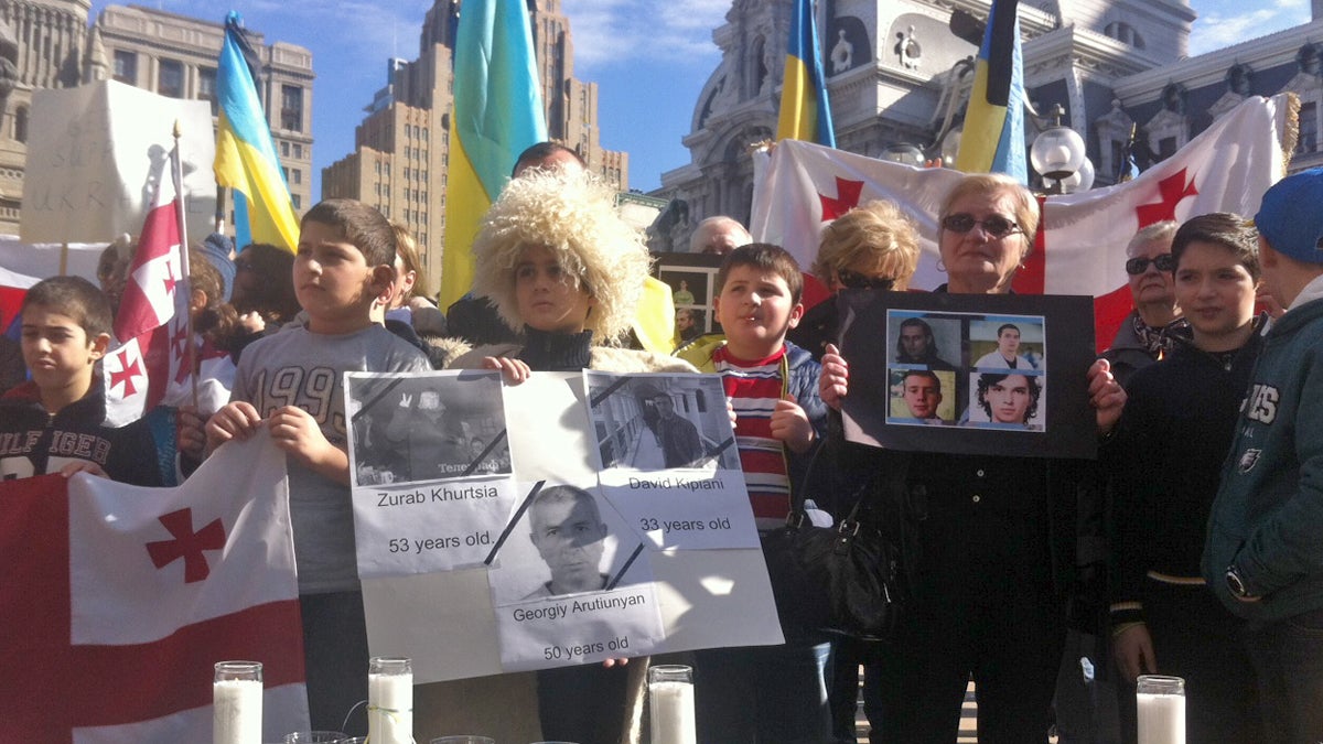  About 200 people gathered outside of City Hall in Philadelphia to honor those who died in Ukraine last week. (Sarah Whites-Koditschek/For NewsWorks)   