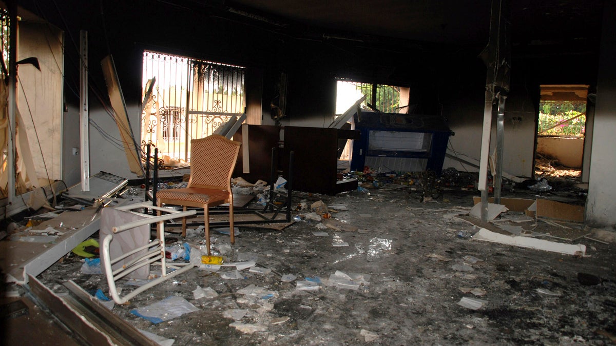  Glass, debris and overturned furniture are strewn inside a room in the gutted U.S. consulate in Benghazi, Libya, after an attack that killed four Americans, including Ambassador Chris Stevens, Wednesday, Sept. 12, 2012. (AP Photo/Ibrahim Alaguri) 