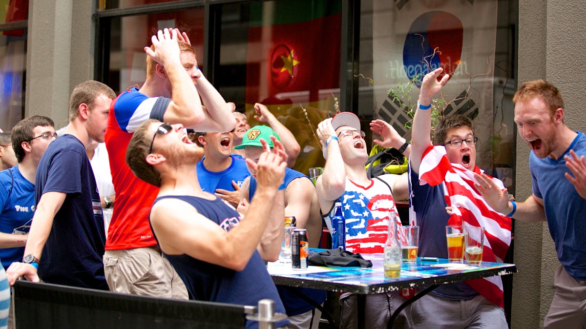  By the end of the game the USA had some scoring chances, as the crowd reacts outside of Fado Irish Pub. (Nathaniel Hamilton/for NewsWorks) 