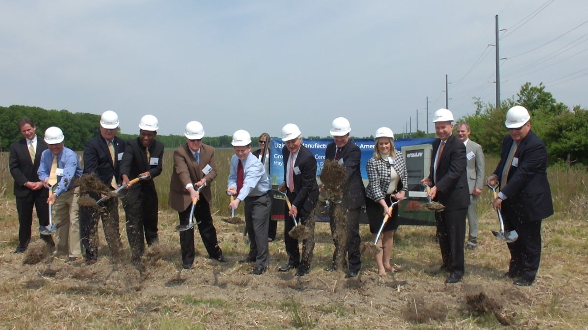  Delaware leaders joined Uzin Utz officials in a ceremonial moving of the dirt at the future site of the 53,000-square-foot facility, which will anchor the Garrison Oak Technical Park in Dover (Photo courtesy Gov. Markell's flickr)  