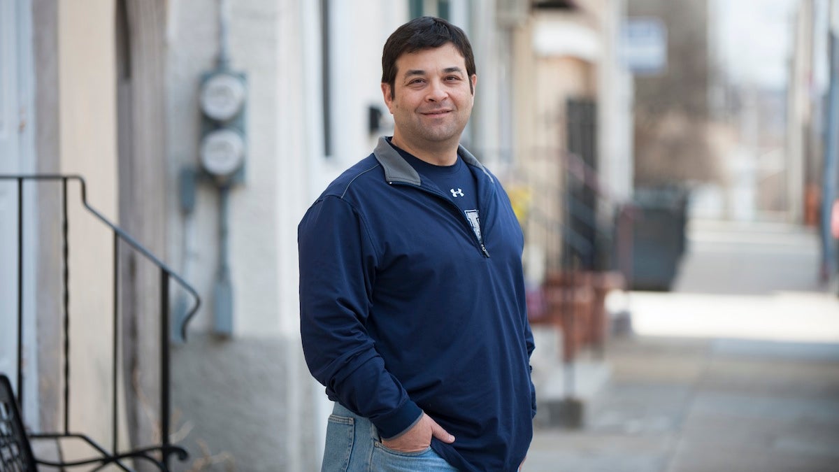  Steve Passio stands on Ridge Avenue in Roxborough. (Tracie Van Auken/for NewsWorks) 