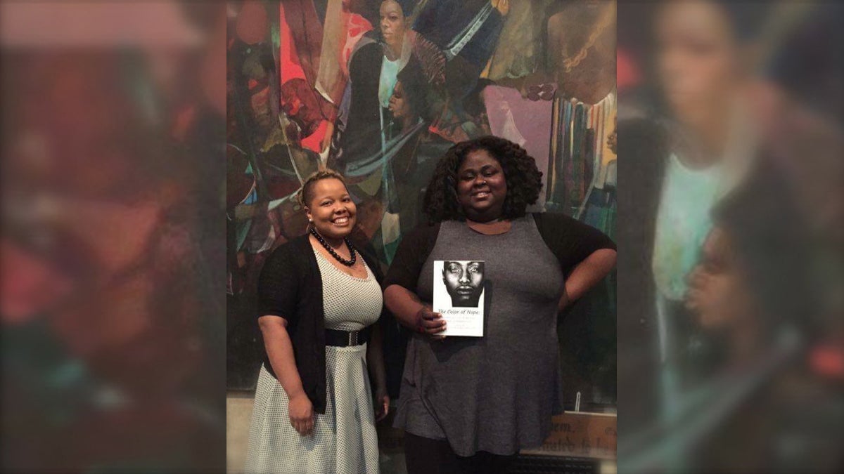 Vanessa Hazzard and Iresha Picot pose with a collection of stories they edited called 'The Color of Hope.' (Photo courtesy of Picot)