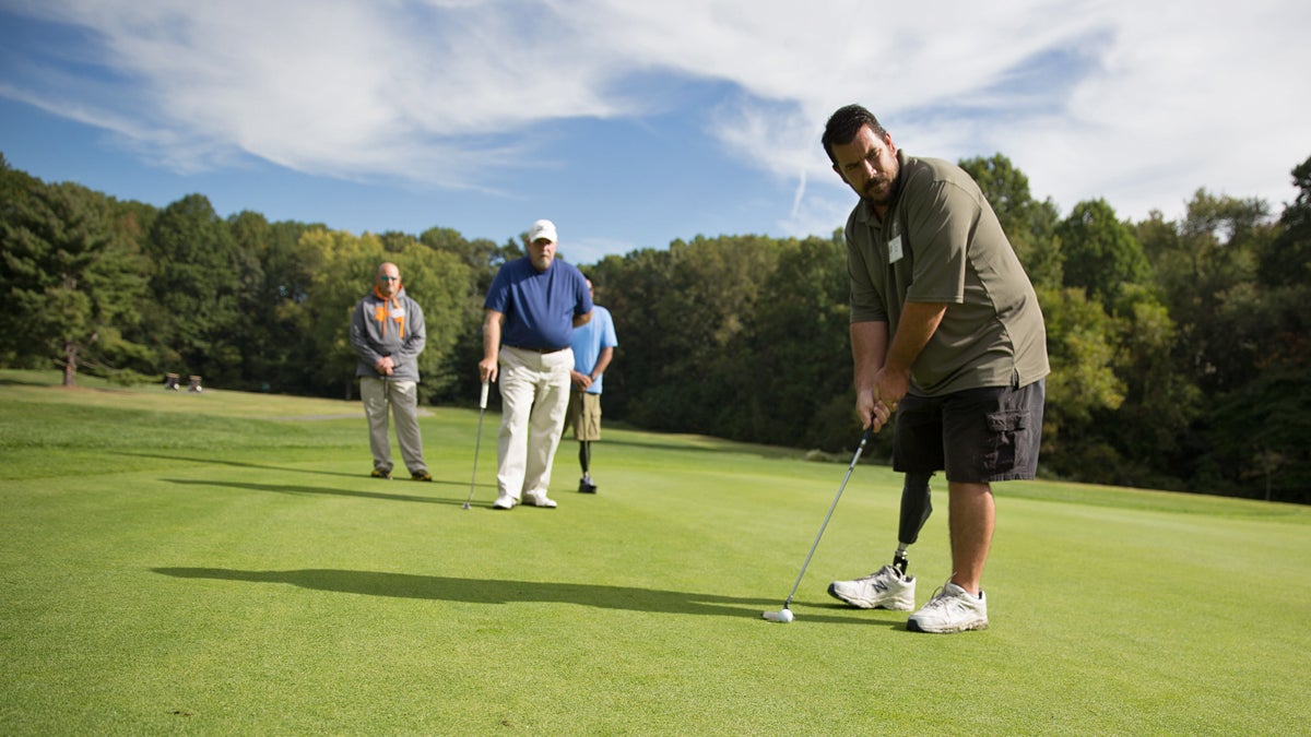  Tim Piper said that the golf clinic is more about therapy for him and being around other veterans than improving his golf game.  (Lindsay Lazarski/WHYY)   