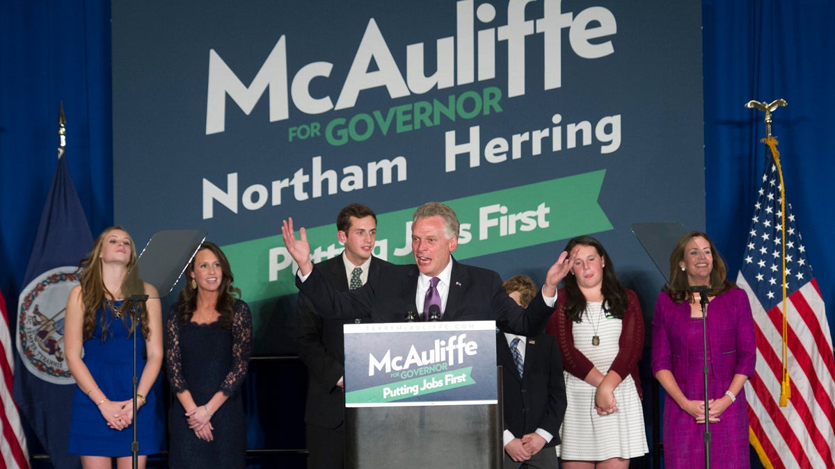  Democratic Virginia Gov.-elect Terry McAuliffe celebrates his election victory with his family during a party in Tysons Corner, Va., Tuesday, Nov. 5, 2013. (AP Photo/Cliff Owen) 