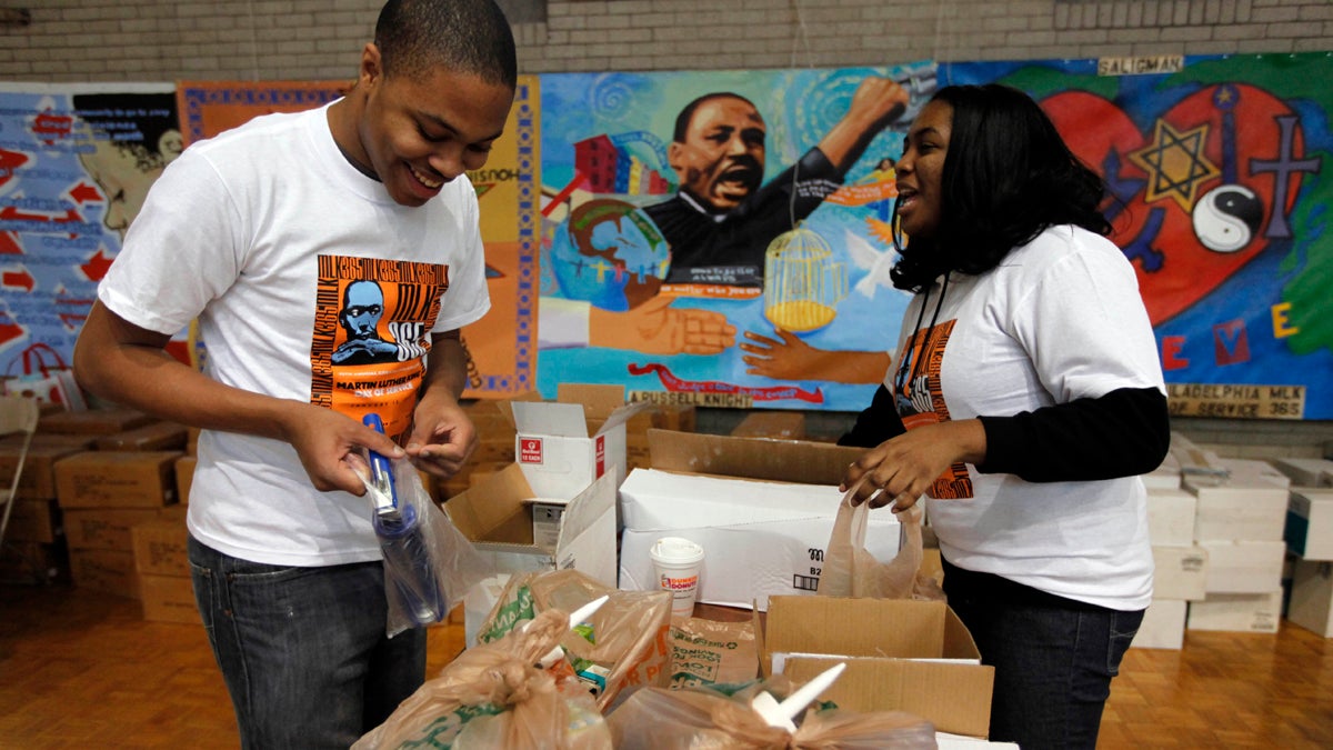  Volunteers Malcolm Kenyatta and Kylie Patterson assemble home weatherization kits during the Greater Philadelphia Martin Luther King Day of Service, at Girard College. (AP File Photo/Matt Rourke) 