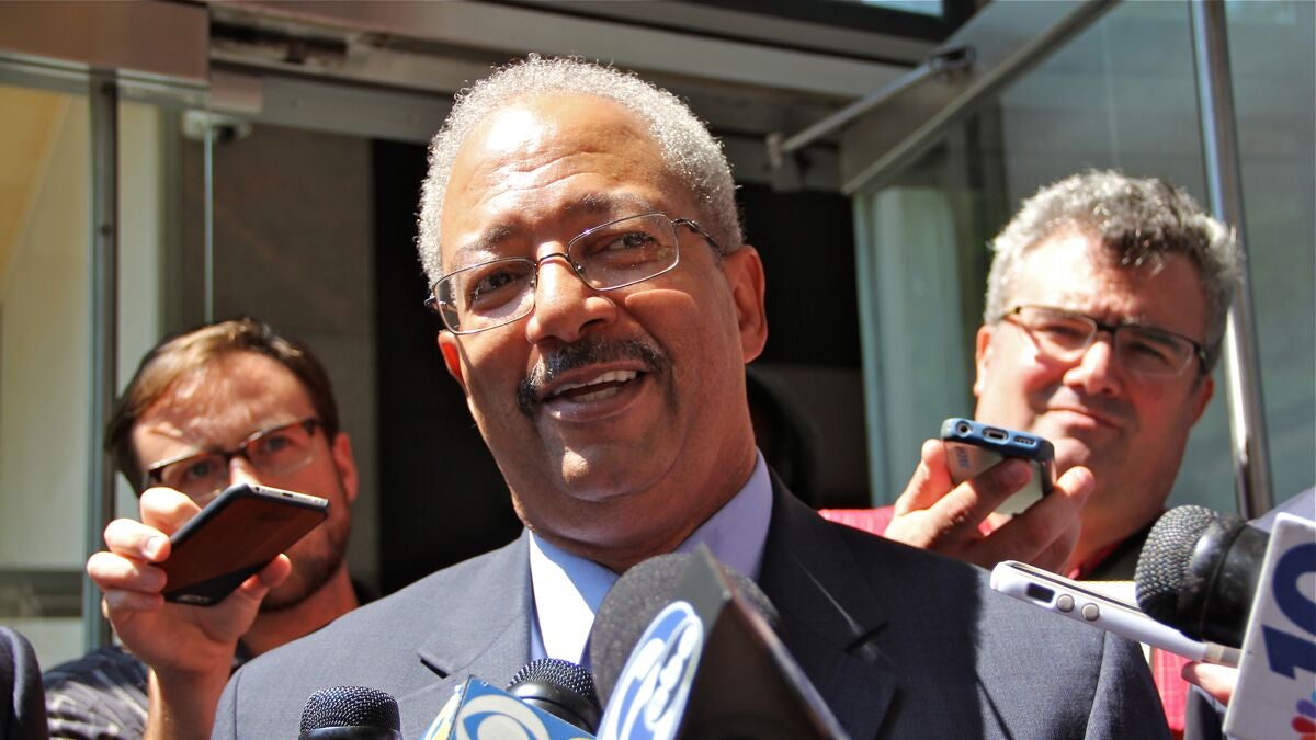 U.S Rep. Chaka Fattah leaves federal court in Philadelphia Tuesday after pleading innocent to corruption charges. (Emma Lee/NewsWorks)