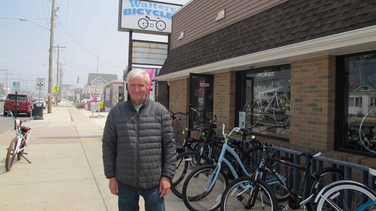  Bicycle shop owner Tom Walters is optimistic about the summer tourism season. (Phil Gregory/WHYY) 