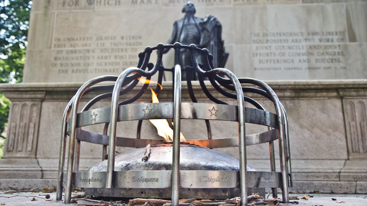 'Freedom is a light for which many have died in darkness.' A monument dedicated to the warriors of the American Revolution stands in Washington Square in Philadelphia. (Kimberly Paynter/WHYY)