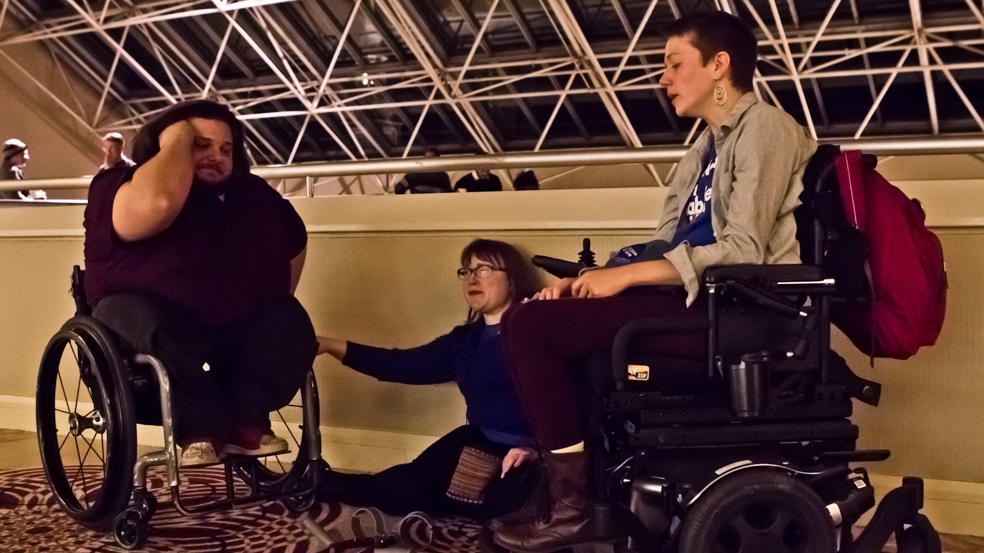 Matthew Clark, Laura Cohen, and Dynah Haubert left the Pa. Democrats watch party as Donald Trump began to claim most of the states in the raise. (Kimberly Paynter/WHYY)