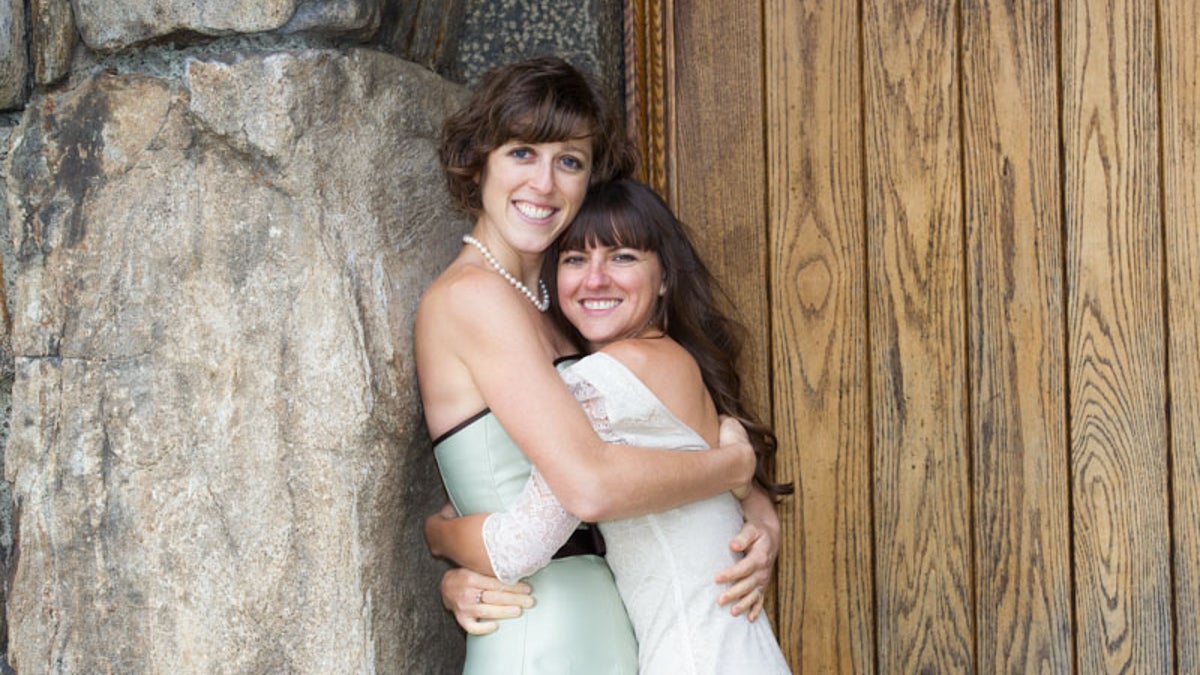 Megan Schneider (left) and Rachelle Schneider on their wedding day in 2013. (Photo by B. Proud)