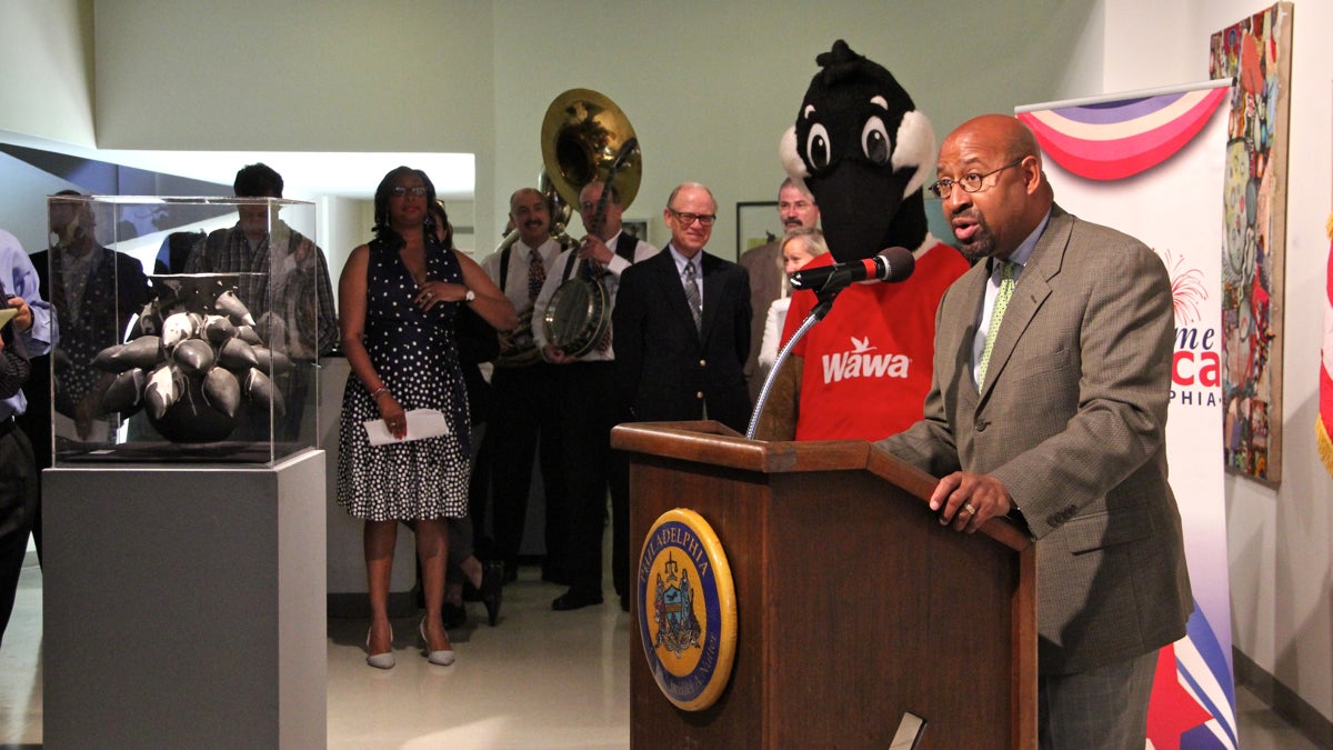  With litteral fanfare, Mayor Michael Nutter announces the return of the Wawa Welcome America July 4 celebration featuring fireworks, free sandwiches and The Roots. (Emma Lee/WHYY) 