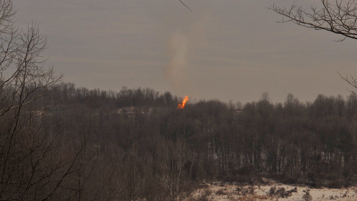  A well fire in Dunkard Township, Greene County as seen from the top of a hill.  The sound of the fire hissing and burning can be heard for miles around. (Katie Colaneri/WHYY) 