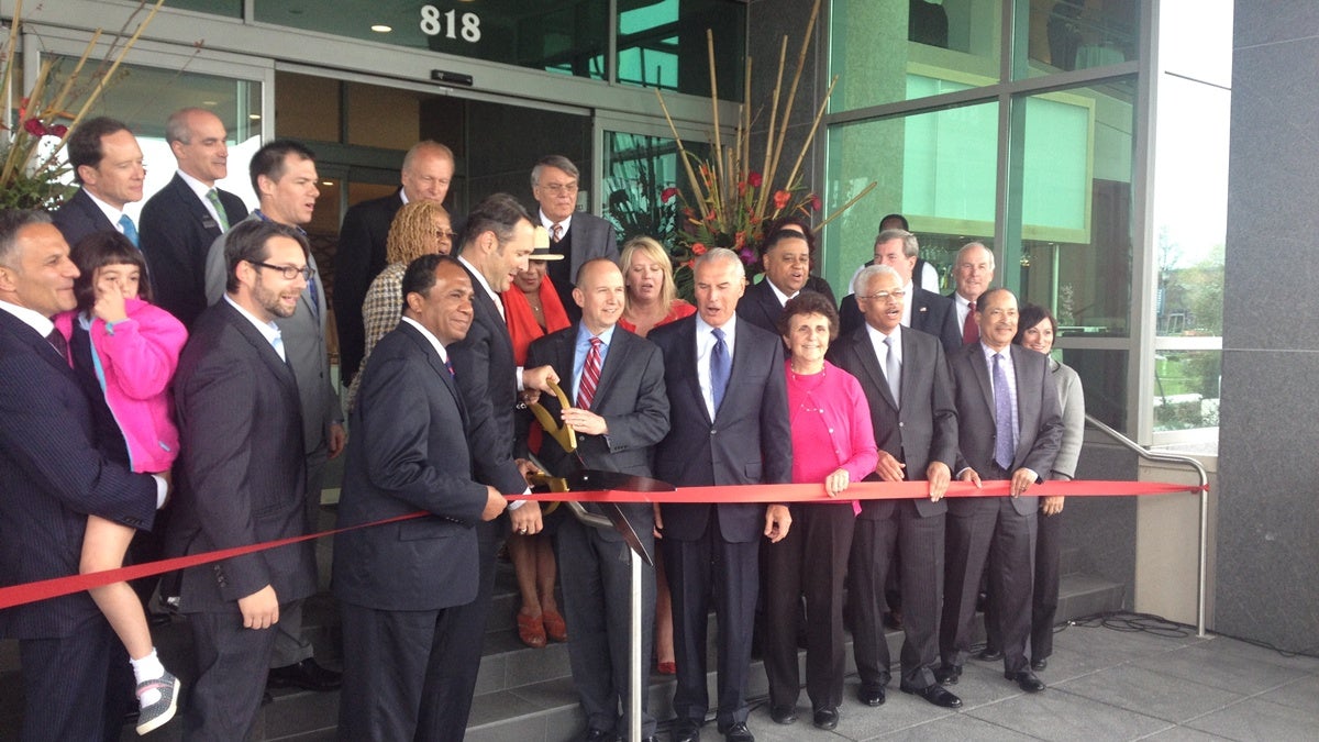  State and local officials cut the ribbon on the brand new, 180-room Westin hotel. (Shana O'Malley/for NewsWorks)  