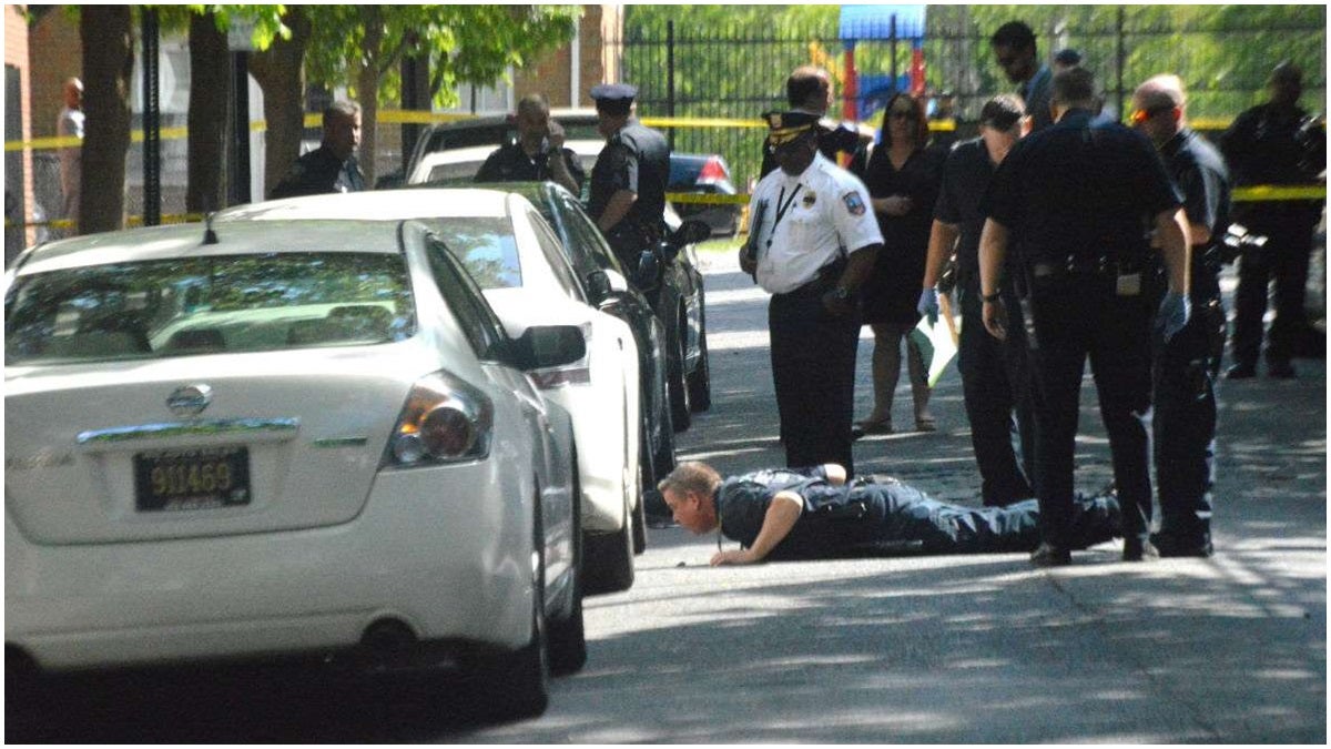 Wilmington Police investigate in the 900-block of Clifford Brown Walk where 15-year-old Brandon Wingo was killed (John Jankowski/for NewsWorks)