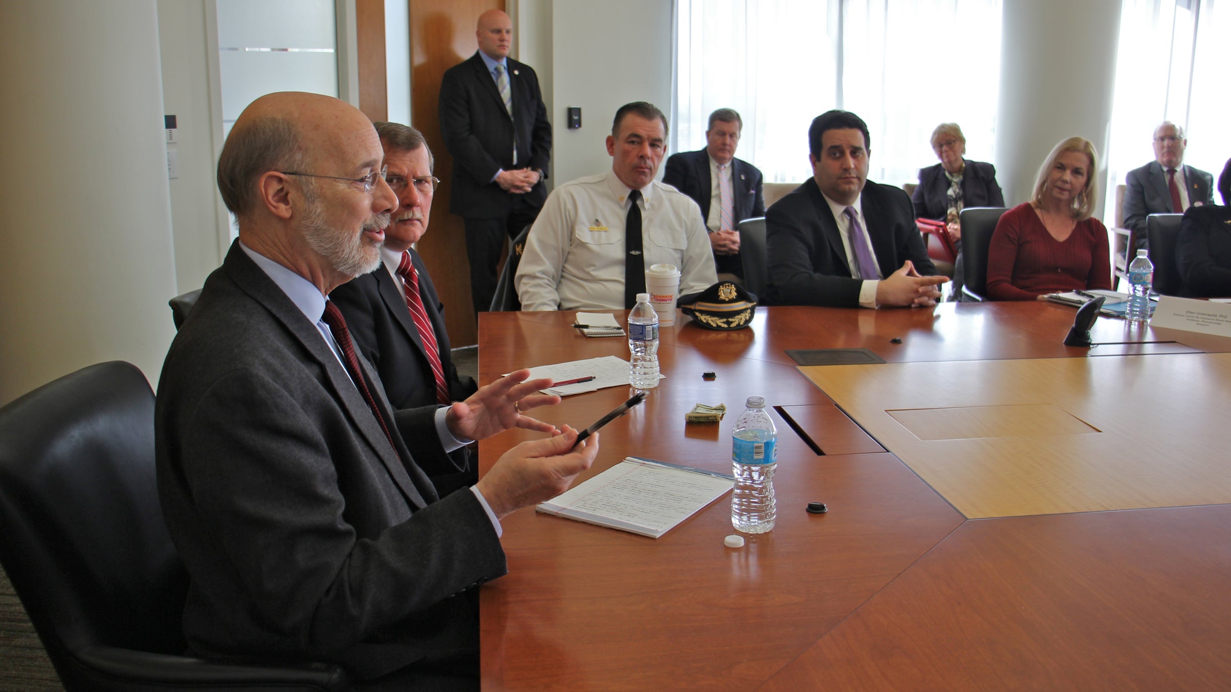 Gov. Tom Wolf presides over a meeting at Temple University's medical school discussing ways to combat opioid addiction. (Emma Lee/WHYY)