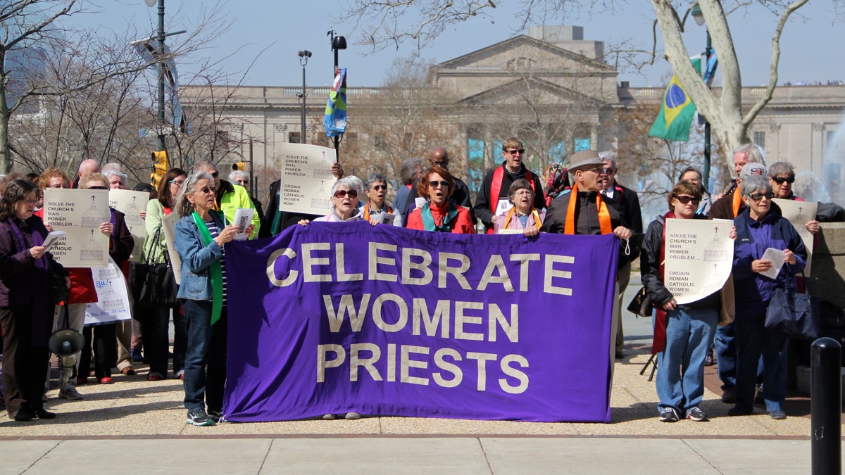 A group that has been lobbying for the ordination of women priests in the Catholic Church holds its annual rally outside  outside the Cathedral Basilica of Saints Peter and Paul. (Emma Lee/WHYY)