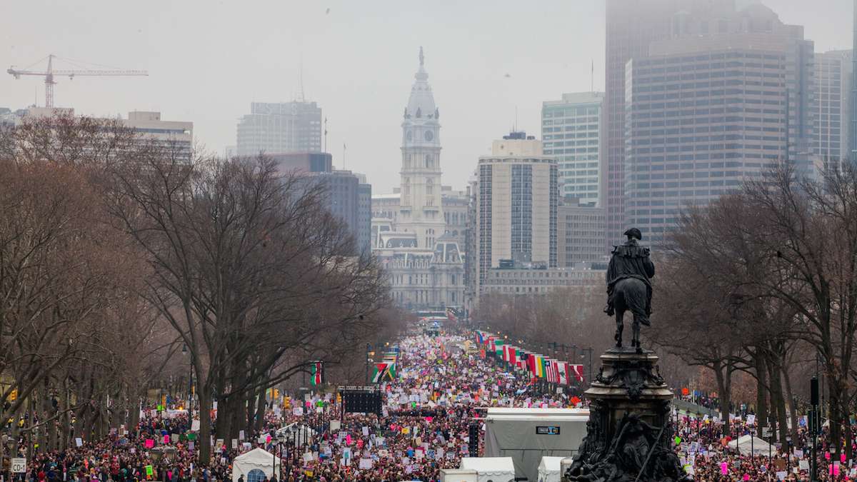  Thousands gathered on the Ben Franklin Parkway the morning of Saturday, January 21, for the Women's March in Philadelphia. (Brad Larrison for NewsWorks) 