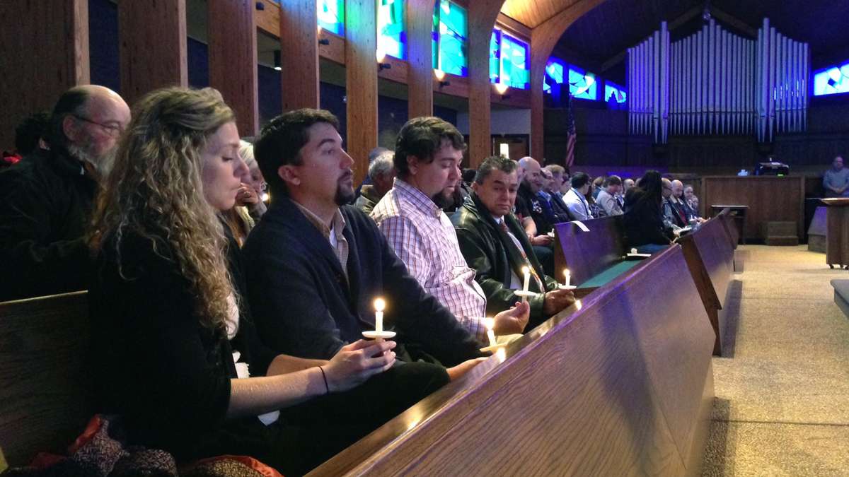  Sheryl Santiago organized a candlelight vigil at St. Paul Lutherian Church in Toms River, N.J., in December in remembrance of people who died from overdoses in 2013. (Tracey Samuelson/WHYY) 