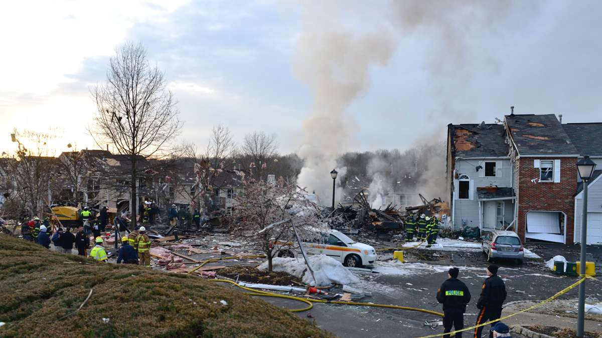  Smoke was visible five hours after an explosion destroyed 10 townhomes in Ewing, N.J. (Bas Slabbers/for NewsWorks) 