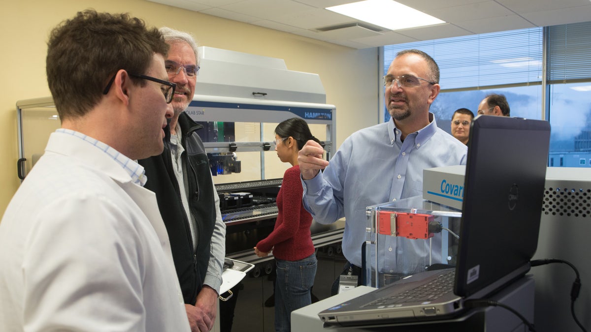  George Yancopoulos,  Regeneron's chief scientific officer; Dr. Scott Mellis; and John Overton are shown in the DNA sequencing labs at the Regeneron Genetics Center in Tarrytown, N.Y. (Image courtesy of Doug Abdelnour) 
