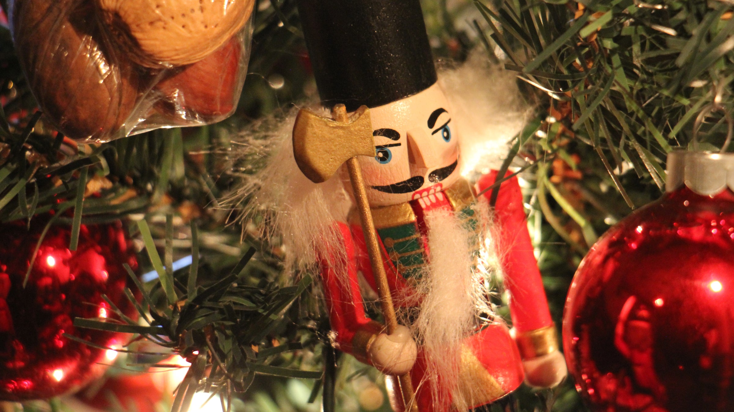 A nutcracker ornament hangs from the Christmas tree at the David Wilson house. (Emma Lee/WHYY)