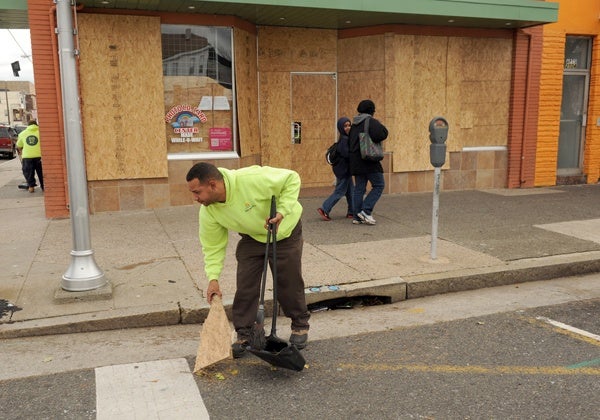 <p><p>Casino Reinvestment Development Authority workers clean up debris at Atlantic and Florida avenues. (Photography by Peter Tobia/Atlantic City Alliance)</p></p>
