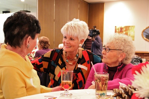 <p><p>Diane Neary, whose husband Robert died in a warehouse fire in April, attends the annual Thanksgiving luncheon for the widows of firefighters. She is accompanied by Alice Brennan (left) and Vivian Jordan. (Emma Lee/for NewsWorks)</p></p>
