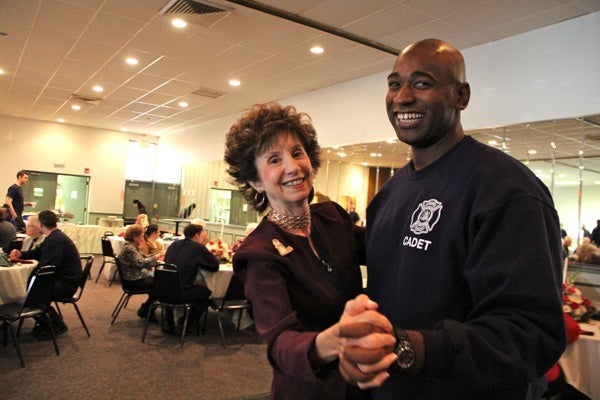 <p><p>Philadelphia firefighter cadet Maurice Putnam dances with Carol Maruschak at the annual Thanksgiving luncheon for firefighter's widows at Local 22 on 5th Street. (Emma Lee/for NewsWorks)</p></p>
