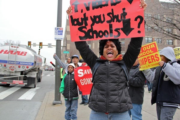 <p><p>Lee Jones shouts to passing motorists on Lincoln Highway during a protest against school closings. She described the proposal to close Gompers and Overbrook elementary schools as "despicable." (Emma Lee/for NewsWorks)</p></p>
