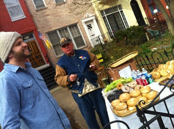 <p><p>Washington, D.C., residents Bill Greenberg and John Ericson capitalize on the inauguration crowds, but keep prices at $1. (Kimberly Paynter/WHYY)</p></p>
