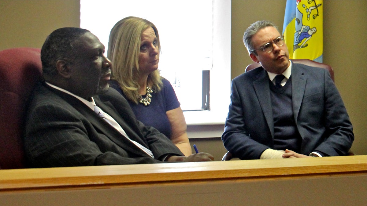  A lawsuit challenges whether the Philadelphia City Commissioners (from left) Anthony Clark, Lisa Deeley, and Al Schmidt, can impartially oversee the May primary election because there is a ballot question that could affect the office. (Emma Lee/WHYY) 