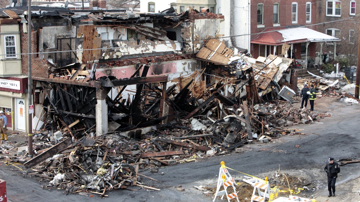  Shown on Jan. 19, 2011, is the site of a gas main explosion in Philadelphia. The gas main explosion, which was caught on video, sent a 50-foot fireball into the sky, killing a utility worker, injuring five other people and forcing dozens of residents from their homes.  (AP Photo/ Joseph Kaczmarek) 
