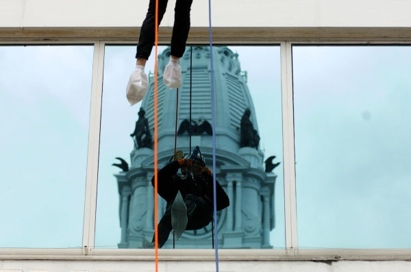 <p><p style="font-size: 13.333333969116211px;">35. Rappeller Nancy Goldenberg saw City Hall reflected as she made her way down the outside of the 20-story glass tower at 1515 Market Street. (Bas Slabbers/for NewsWorks)</p></p>

