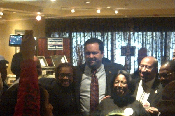 <p><p>Mayor Michael Nutter and City Councilwoman Marian Tasco (second and third from right respectively) pose for a picture with NAACP President Benjamin Jealous at lunch in West Oak Lane on Election Day. (Brian Hickey/WHYY)</p></p>
