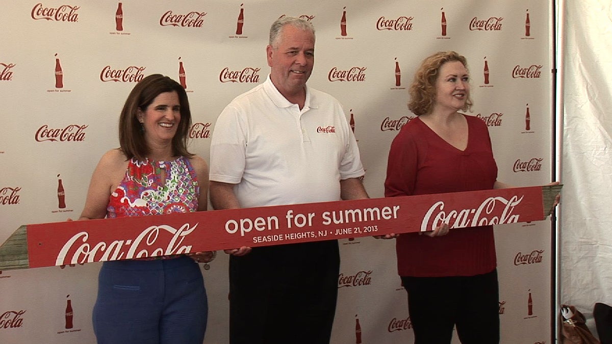  New Jersey First Lady Mary Pat Christie (left) holds a symbolic 