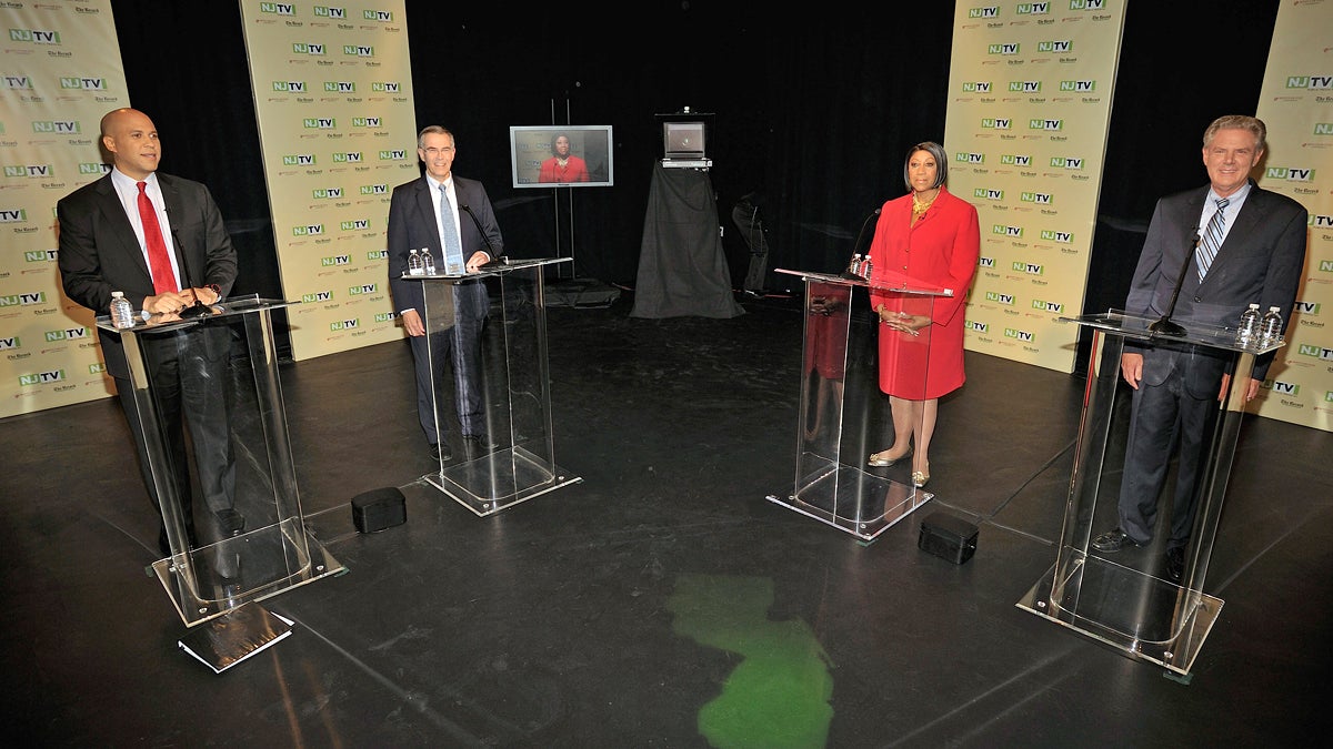  Newark Mayor Cory Booker, Rep. Rush Holt, Assembly Speaker Sheila Oliver and Rep. Frank Pallone stand during a camera test before a U.S. Senate Democratic Primary debate televised on NJTV from Montclair State University in Montclair, N.J. on Monday, Aug. 5, 2013. (AP Photo/NJTV, Joseph Sinnott) 
