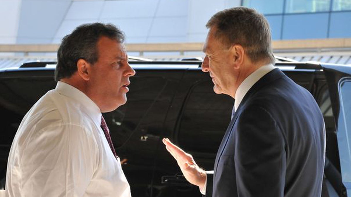  Governor Chris Christie, left, and David Samson, a former Port Authority chairman, have a conversation after a press conference at the Newark Liberty International Airport. 