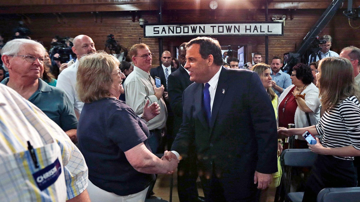  Gov. Christie shakes hands with guests as he arrives at a town hall meeting in Sandown, N.H., Tuesday June 30, 2015. (AP Photo/Charles Krupa) 